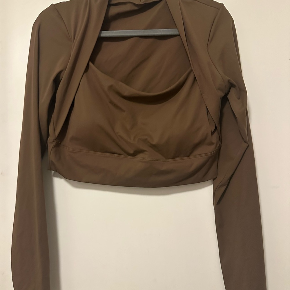 HALARA Brown Long Sleeve Women's Workout Top with finger loop and built in bra.